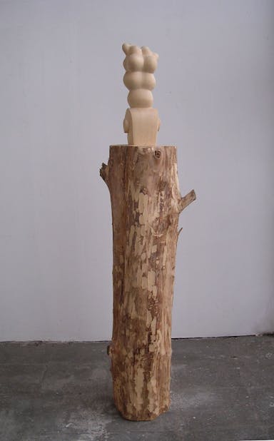 wood on pillar artpiece